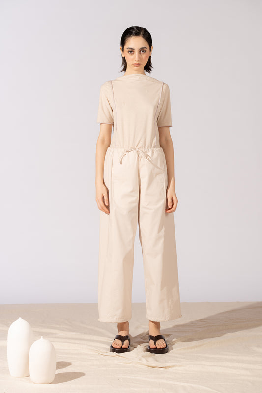 Pantaloni Jasmine cotone bio con elastico in vita e coulisse alla caviglia - Mandorla